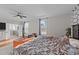Bright open bedroom with a ceiling fan, seating area and plenty of space to relax and enjoy your privacy at 128 S Clearbrook Ct, Angier, NC 27501
