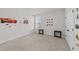 Carpeted bedroom has bright natural light and fun Cars themed wall decor at 128 S Clearbrook Ct, Angier, NC 27501