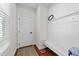 Welcoming entryway featuring a mudroom-style bench with hooks and a convenient door at 128 S Clearbrook Ct, Angier, NC 27501