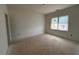 Bright bedroom with a large window and neutral decor at 132 Tennyson Dr, Garner, NC 27529
