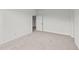 Roomy bedroom with carpet and access to another room at 132 Tennyson Dr, Garner, NC 27529