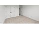 Spacious bedroom with double doors and neutral carpeting at 132 Tennyson Dr, Garner, NC 27529