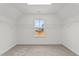 Bright walk-in closet with window and wire shelving at 132 Tennyson Dr, Garner, NC 27529