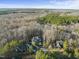 Aerial view of homes in wooded neighborhood at 148 Hidden Creek Ct, Pittsboro, NC 27312