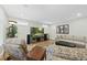 Finished basement features a comfortable sitting area with a large TV and hardwood floors at 148 Hidden Creek Ct, Pittsboro, NC 27312