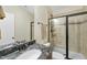 Basement bathroom with granite countertop, shower, and tub at 148 Hidden Creek Ct, Pittsboro, NC 27312