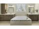 Spa-like bathroom with double vanity and soaking tub at 148 Hidden Creek Ct, Pittsboro, NC 27312