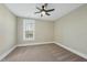 Simple bedroom with single window and ceiling fan at 148 Hidden Creek Ct, Pittsboro, NC 27312