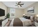 Bedroom with TV, ceiling fan, and king-size bed at 148 Hidden Creek Ct, Pittsboro, NC 27312
