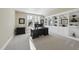 Home office with built-in shelving and large desk at 148 Hidden Creek Ct, Pittsboro, NC 27312