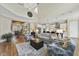 Open floor plan living room with hardwood floors and high ceilings at 148 Hidden Creek Ct, Pittsboro, NC 27312