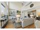 Living room with high ceilings, hardwood floors, and a fireplace at 148 Hidden Creek Ct, Pittsboro, NC 27312