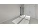 Bright bedroom with double doors to closet and bathroom at 154 Tennyson Dr, Garner, NC 27529