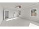 Primary bedroom with ceiling fan and access to bathroom at 154 Tennyson Dr, Garner, NC 27529