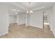 Spacious dining area with hardwood floors and access to other rooms at 154 Tennyson Dr, Garner, NC 27529