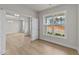 Home office with hardwood floors and a large window offering natural light at 154 Tennyson Dr, Garner, NC 27529