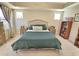 Spacious bedroom with large bed, nightstands, and built-in shelves at 1709 Chestnut Falls Rd, Wendell, NC 27591