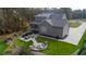 Aerial view of home, backyard patio, and fire pit at 2182 Seaforth Rd, Pittsboro, NC 27312