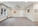 Bedroom with window, ceiling fan, and neutral decor at 2182 Seaforth Rd, Pittsboro, NC 27312