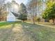 Large backyard with detached garage and storage shed at 250 Kentview Dr, Pittsboro, NC 27312