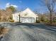 Detached two car garage with gravel driveway at 250 Kentview Dr, Pittsboro, NC 27312