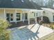 House exterior showcasing a back deck, patio, and pergola at 250 Kentview Dr, Pittsboro, NC 27312