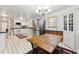Eat-in kitchen with stainless steel appliances and ample cabinet space at 253 Ronald Tharrington Rd, Louisburg, NC 27549