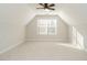 Spacious bedroom with window and ceiling fan at 263 Meadow Beauty Dr, Apex, NC 27539