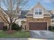 Attractive 2-story home with stone accents and a 2-car garage at 263 Meadow Beauty Dr, Apex, NC 27539