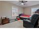 Bedroom featuring carpet and a ceiling fan at 302 S Pine St, Benson, NC 27504