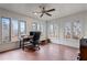 Bright home office with natural light, tiled floors, and a functional workspace at 302 S Pine St, Benson, NC 27504