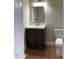 Clean bathroom with single sink vanity and toilet at 307 Westfield Dr, Dunn, NC 28334
