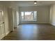 Spacious bedroom with hardwood floors and bay window at 307 Westfield Dr, Dunn, NC 28334