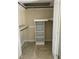 Large walk-in closet with built-in shelving and hanging rods at 307 Westfield Dr, Dunn, NC 28334