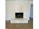 White brick fireplace in the living room at 307 Westfield Dr, Dunn, NC 28334