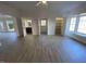 Bright living room with hardwood floors and access to bathroom and closets at 307 Westfield Dr, Dunn, NC 28334
