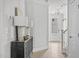 Elegant entryway featuring stylish table with decorative lamps, leading to a bright front door with sidelights at 3400 Amelia Grace Dr # 46, Fuquay Varina, NC 27526
