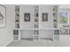 Bright home office featuring custom built-in shelving, stylish decor, and a dedicated work space at 3400 Amelia Grace Dr # 46, Fuquay Varina, NC 27526