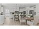 Bright kitchen with a large island, pendant lighting, stainless steel appliances, and backsplash at 3400 Amelia Grace Dr # 46, Fuquay Varina, NC 27526