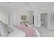 Bright main bedroom with large windows, plush carpet, and elegant furnishings offers a serene retreat at 3400 Amelia Grace Dr # 46, Fuquay Varina, NC 27526
