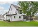 Beautiful rear exterior view of the home showcasing the well-manicured lawn and screened-in porch at 3400 Amelia Grace Dr # 46, Fuquay Varina, NC 27526