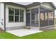 Charming screened porch offering seamless indoor-outdoor living with a patio at 3400 Amelia Grace Dr # 46, Fuquay Varina, NC 27526