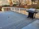 View of a large wooden deck with a grill, perfect for outdoor entertaining at 4300 Hickory Ridge Dr, Raleigh, NC 27609