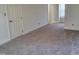 Spacious bedroom featuring neutral walls, carpet, and a bright, airy feel at 4300 Hickory Ridge Dr, Raleigh, NC 27609