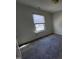 Bedroom featuring carpeting, light walls, and a window with blinds at 4300 Hickory Ridge Dr, Raleigh, NC 27609