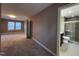 Bedroom with ensuite bathroom and carpet flooring at 4300 Hickory Ridge Dr, Raleigh, NC 27609