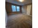Bedroom featuring neutral walls, plush carpet, and plenty of natural light at 4300 Hickory Ridge Dr, Raleigh, NC 27609