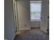 Bright bedroom with a window providing natural light and fresh white trim at 4300 Hickory Ridge Dr, Raleigh, NC 27609