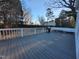 Spacious outdoor deck with railing, ideal for enjoying the backyard and grilling with friends at 4300 Hickory Ridge Dr, Raleigh, NC 27609