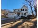 Well-maintained two-story home boasts a spacious driveway, manicured lawn, and an attached two-car garage at 4300 Hickory Ridge Dr, Raleigh, NC 27609
